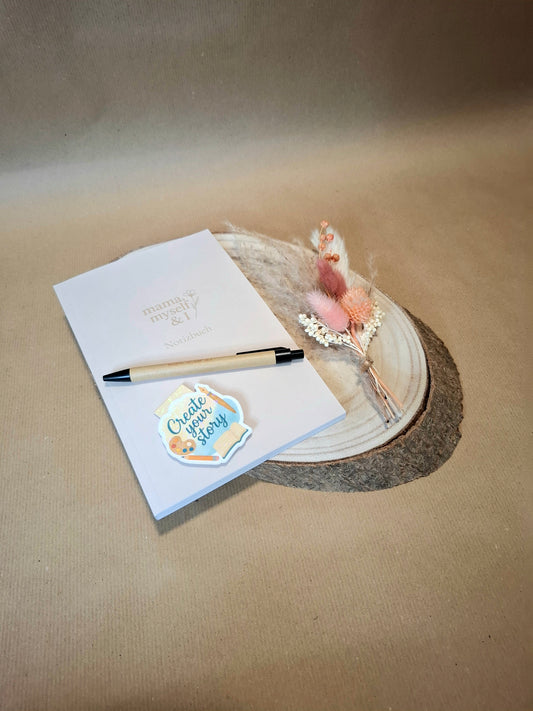 Notizbuch mit floralen Akzenten, Bundle bestehend aus Buch, Stift und magnetischem Lesezeichen